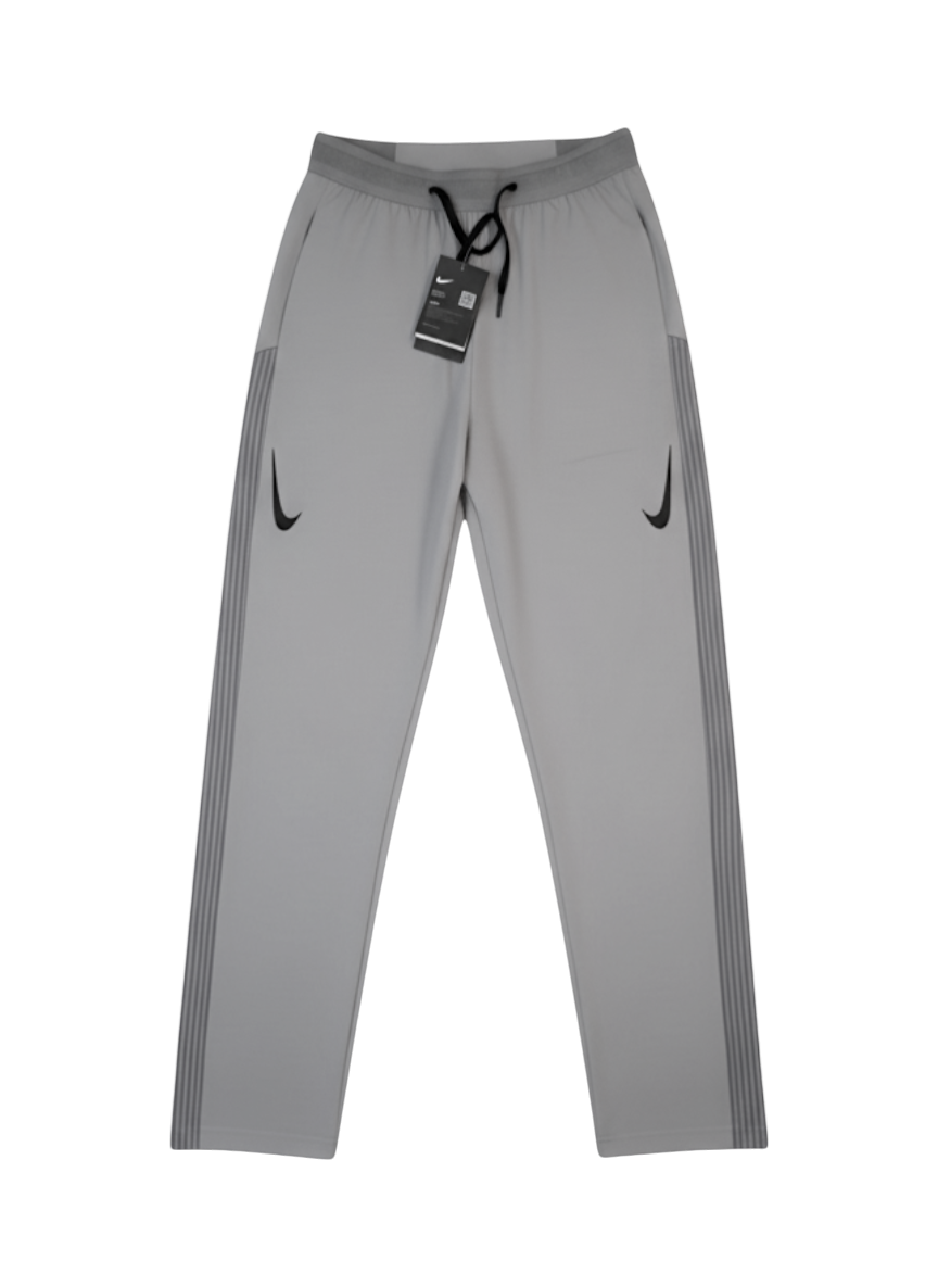 Plugmarket grey Nike Aeroswift running pants with black drawstring and side stripe detail.