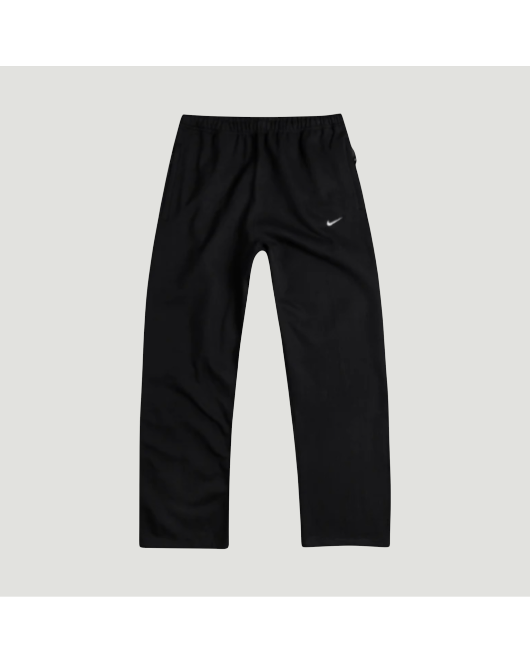 Plugmarket Nike Solo Swoosh black polyester jogging pants with embroidered Swoosh logo.
