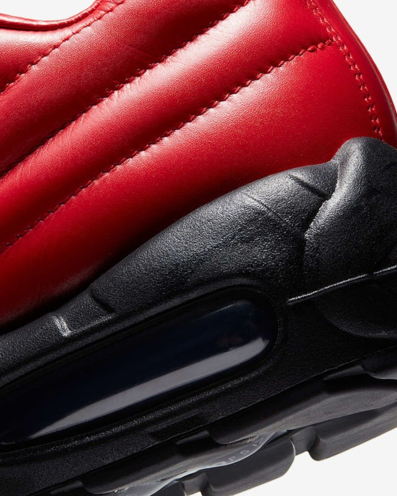 Plugmarket Nike x Supreme Air Max 95 Lux Gym Red quilted leather sneakers with black sole and visible air cushioning.
