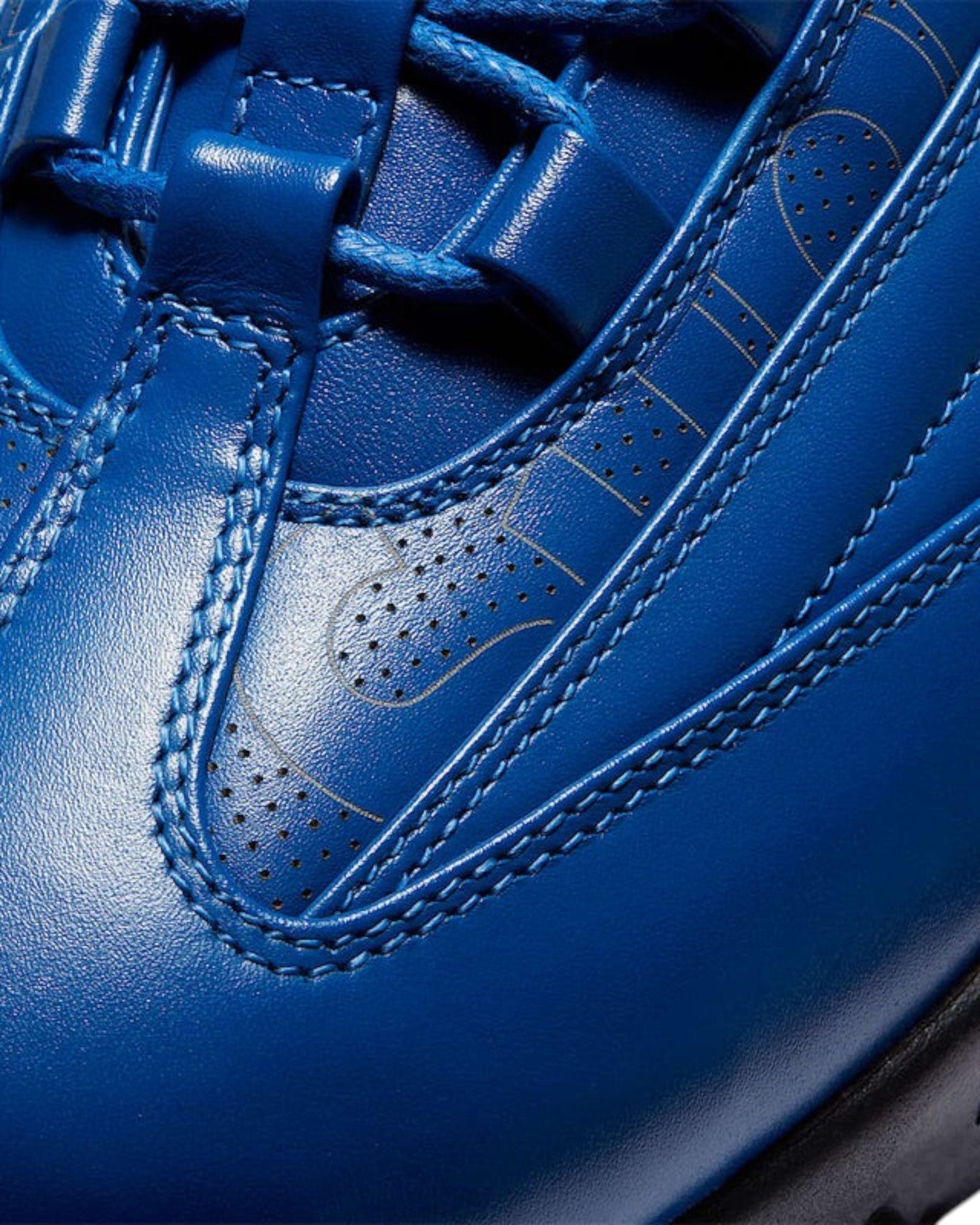Plugmarket Nike x Supreme Air Max 95 Lux Hyper Cobalt blue leather sneakers with perforated details and gold accents.