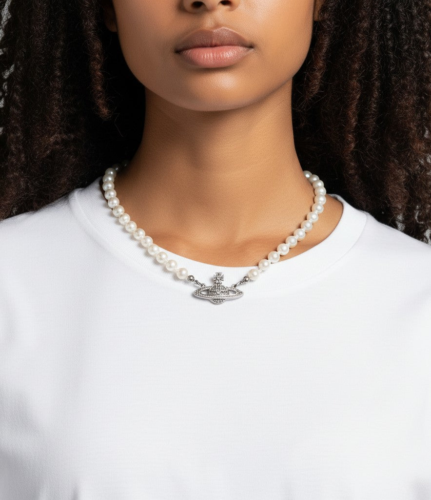 Plugmarket Vivienne Westwood pearl choker with Saturn Orb pendant adorned with white crystals. 40cm length.